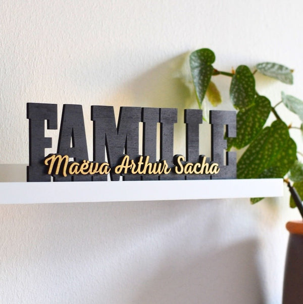 Personalized FAMILY word in wood with first names